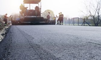 workers-placing-new-coating-asphalt-road (1) workers-placing-new-coating-asphalt-road (1)